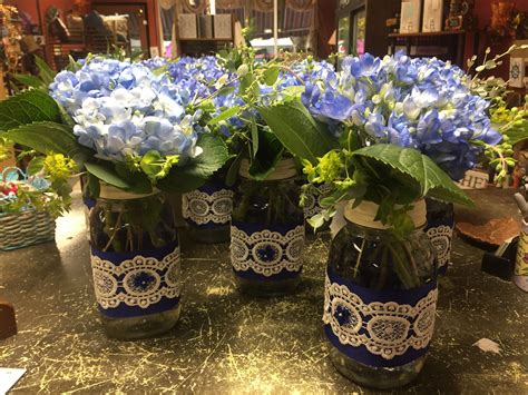 Blue hydrangeas in Mason jars with burlap and lace | Mason jar flower ...
