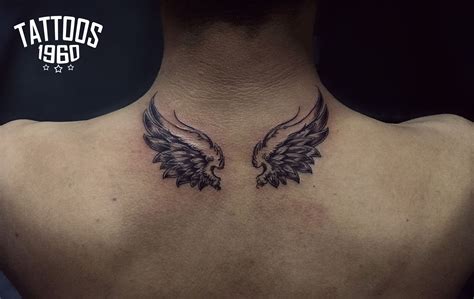 wings tattoo, angel tattoo, neck tattoos | Back of neck tattoo, Wings tattoo, Neck tattoos women