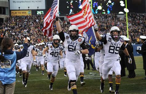 The U.S. Naval Academy football team, the Midshipmen, - NARA & DVIDS ...