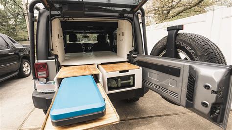 Full Bed Platform & Sliding Kitchen - Jeep Wrangler Camper Conversion Build Part 1 - YouTube