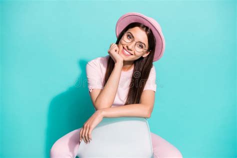 Photo of Positive Attractive Girl Sit on Chair Toothy Smile in Camera Over Teal Color Background ...