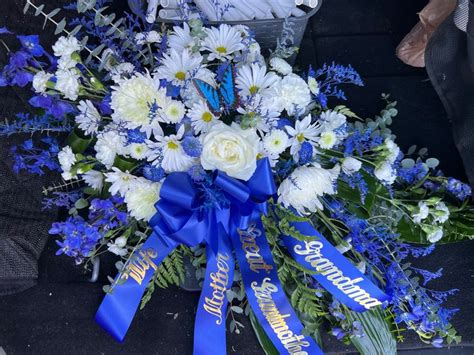 Beautifully Blue | Casket flowers, Casket sprays, Funeral floral ...