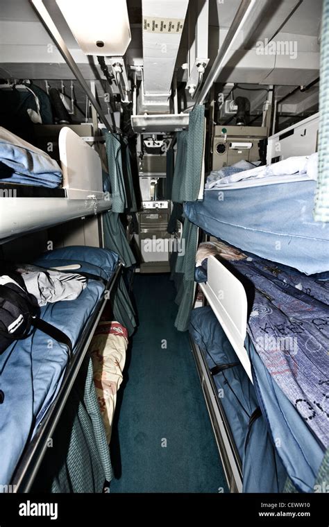 Sleeping quarters on naval aircraft carrier HMS Illustrius Stock Photo - Alamy