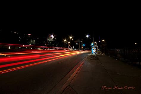 Car Lights At Night Photograph by Pierre A Houle