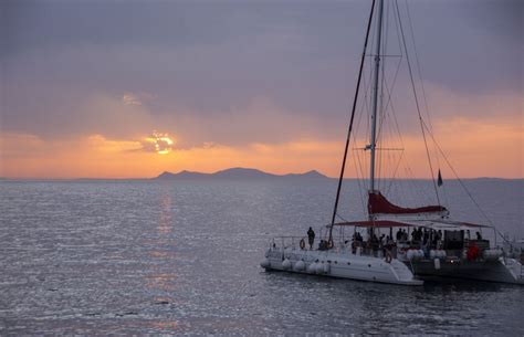 Santorini Sunset Cruise - Living + Nomads – Travel tips, Guides, News ...