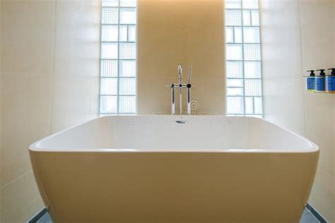 White Bathtub in a Luxury Hotel Room, Classic Bathroom Stock Image - Image of background, decor ...