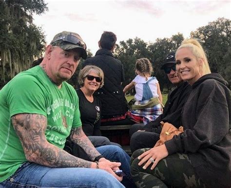 Undertaker and Michelle MicCool | Wwe couples, Wwe superstars, Vince ...