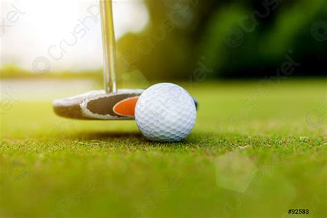 Golf equipment, golf ball and stick - stock photo | Crushpixel