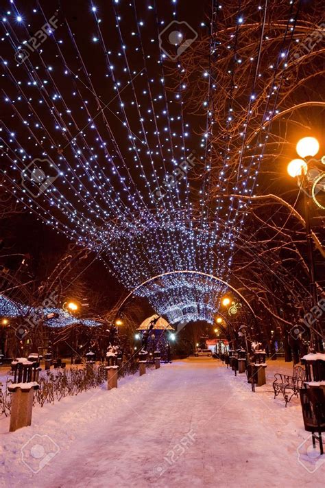 Scenic View Of Decorated Winter City Park At Night Stock Photo ...