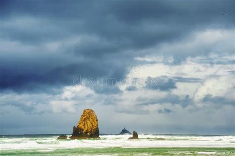 Stormy Weather at Cannon Beach Oregon Stock Photo - Image of rocks ...