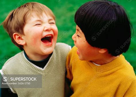 Friends Laughing - SuperStock