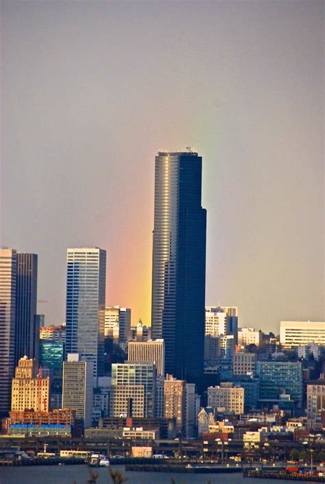 A rainbow provided colorful backlighting to the Seattle skyline on ...