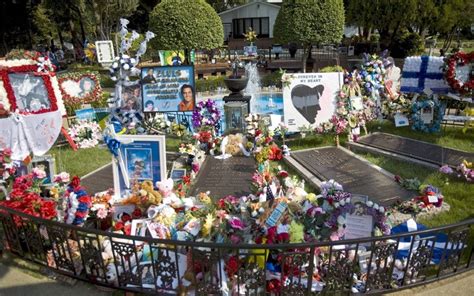 Elvis Presley fans gather at Graceland on the 35th anniversary of his death