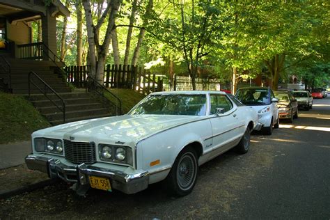 OLD PARKED CARS.: 1974 Mercury Montego MX.