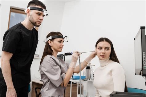 Premium Photo | Ears endoscopy of woman patient ent colleagues doing ...