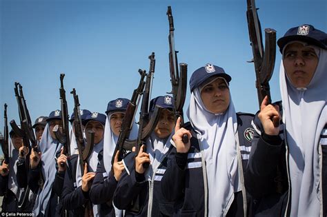 The all-female Hamas police force taught how to fire machine guns on Gaza strip | Daily Mail Online