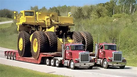 Witnessing the Unison of Two Trucks Carrying the Largest Excavator ...