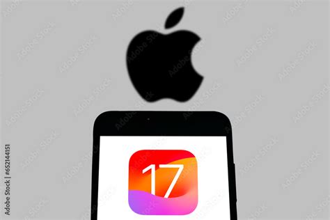 Logo of iOS 17 displayed on phone screen Stock Photo | Adobe Stock