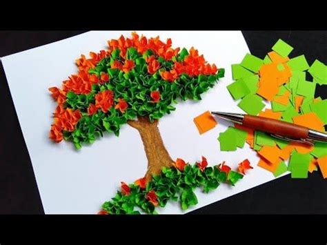 an art project made out of construction paper and colored crepe paper ...