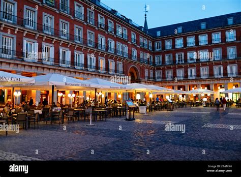 Outdoor Dining at Night in Plaza Mayor, Madrid, Spain Stock Photo ...