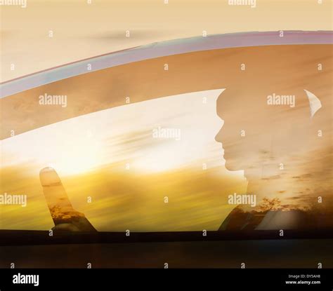 Silhouette of woman driving car Stock Photo - Alamy