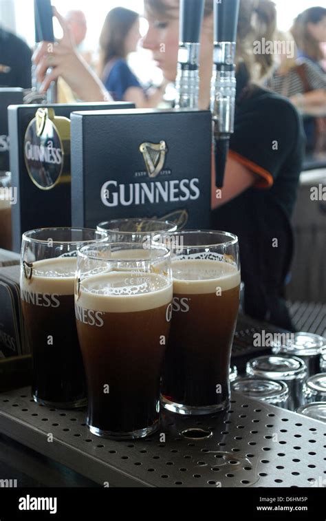 Pints of Guinness being served in the Gravity Bar at Guinness ...