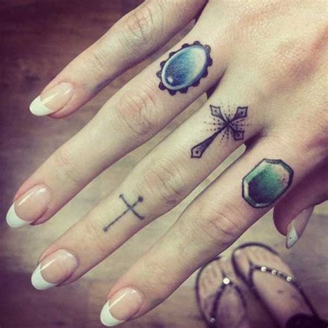 Small Cross Tattoos On Finger