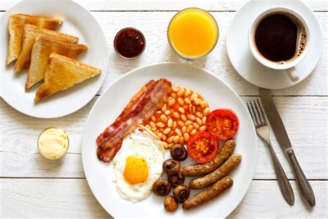 Traditional fried English breakfast with orange juice and coffee from above. - Christleton House