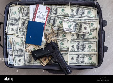 Open suitcase with one million dollars bills stacks Stock Photo - Alamy