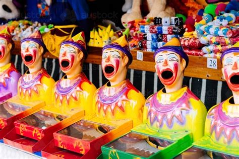 Image of clown ball game at a fun fair - Austockphoto