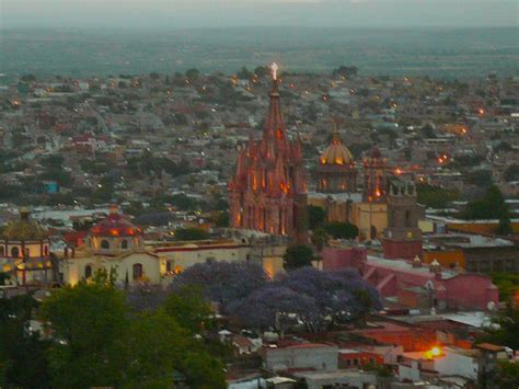 Sunset, in San Miguel de Allende from Montes de Oca, spring and the Jaccaranda are in blue bloom ...