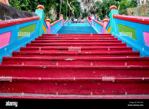 The famous colorful stairs at Batu Caves Stock Photo - Alamy