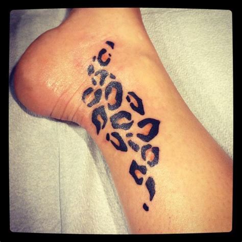 leopard print | Tatuajes estampado de leopardo, Tatuajes en los pies ...