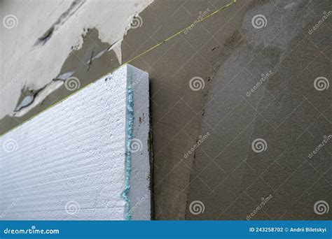 Installation of Styrofoam Insulation Sheets on House Facade Wall for ...