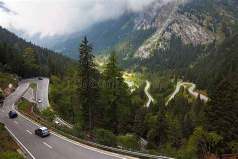 Cars on a Steep Mountain Road Turn Stock Image - Image of people, line: 186537411