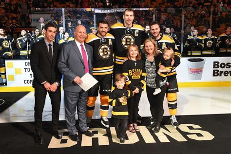 Chris Kelly, Patrice Bergeron, Zdeno Chara, and David Krejci of the Boston Bruins present their ...