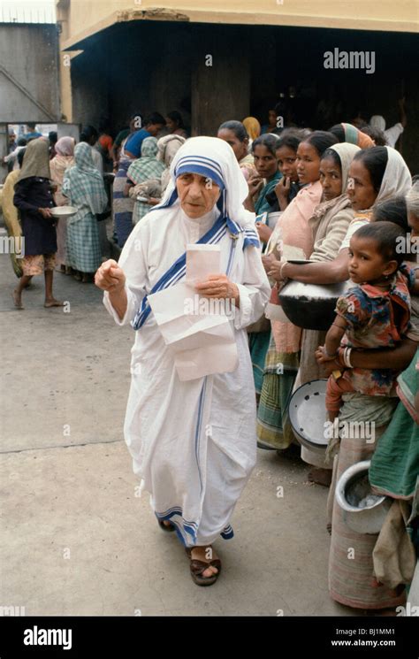 Mother Teresa Helping The Poor