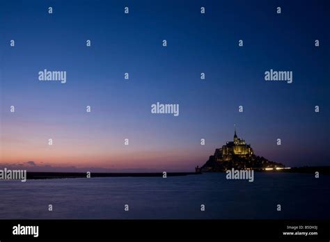 Mont St Michelle at sunset Stock Photo - Alamy