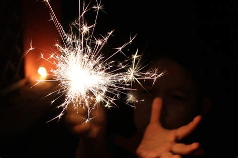 Free Images : light, night, play, flower, kid, sparkler, celebration ...