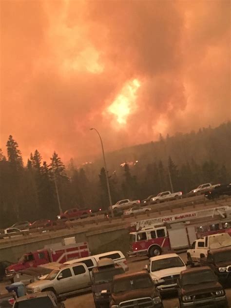 2016 Another view of the fire threatening Fort McMurray with multiple first responders at the ...
