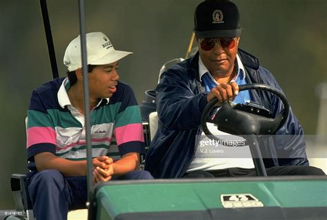 15 year old Eldrick Tiger Woods with father Earl Woods in cart while... News Photo - Getty Images