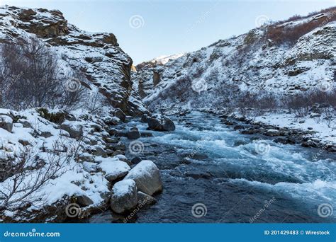 River Streaming from the Glymur Waterfall in Iceland in Winter Stock Image - Image of rocky ...