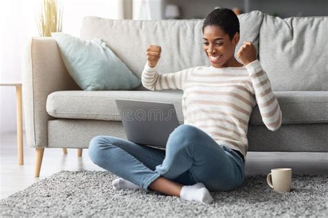 Overjoyed Excited Black Woman Celebrating Success with Laptop at Home Stock Image - Image of ...