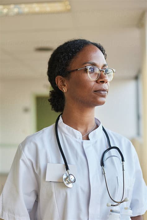 "Portrait Of Young Female African American Doctor With Stethoscope" by ...