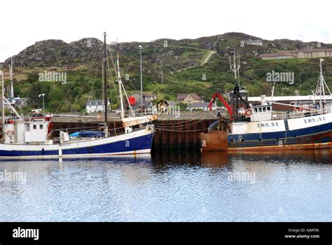 Fishing vessel in harbour at Lochinver Loch Inver Atlantic coast Hiaghland Scotland Stock Photo ...