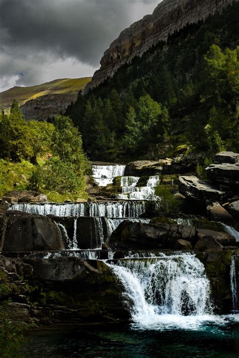 Cascading waterfalls in the Spanish Pyrenees [OC] [1067x1600] : r/EarthPorn