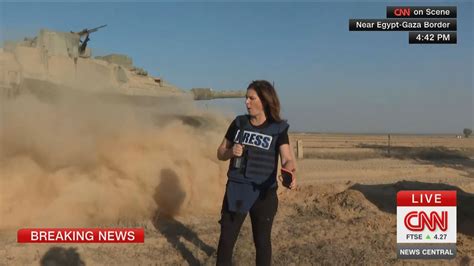 CNN anchor on Israel's border with Gaza shows Israeli tanks moving into ...