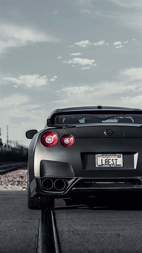 Download Matte Black GTR R35 Wallpaper | Wallpapers.com