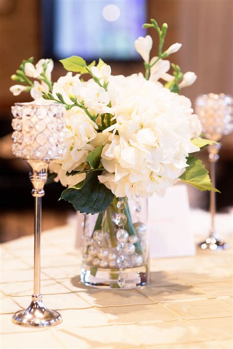 White Hydrangea Centerpiece With Candles