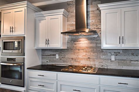 White cabinets, wood look tile, kitchen backsplash, flat panel cabinets ...